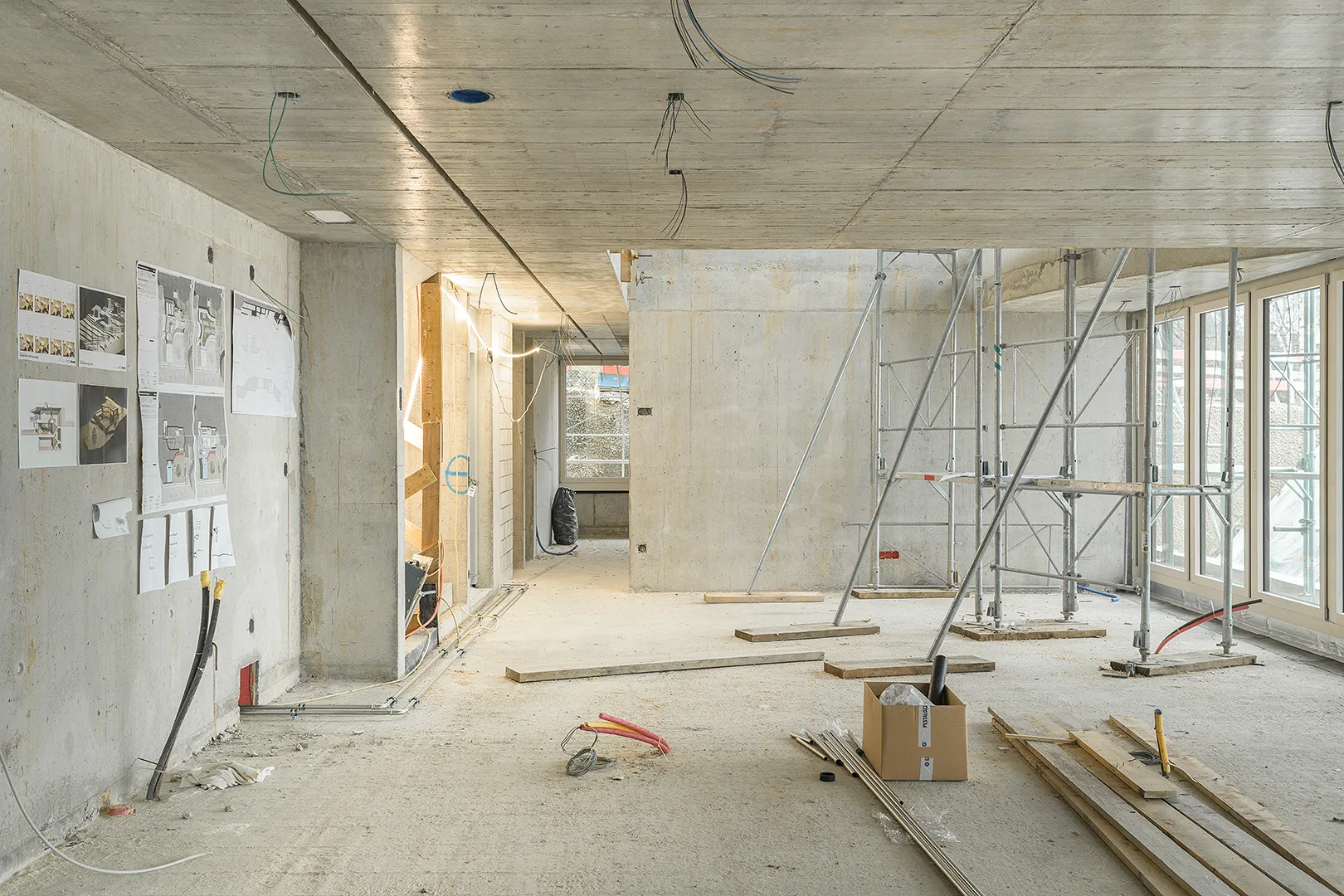 Architecture Photography of an interior of the construction-site at Winkelhaus by architects Estudio KMMK, construction by atelier rosinus, structure by schnetzer puskas. 